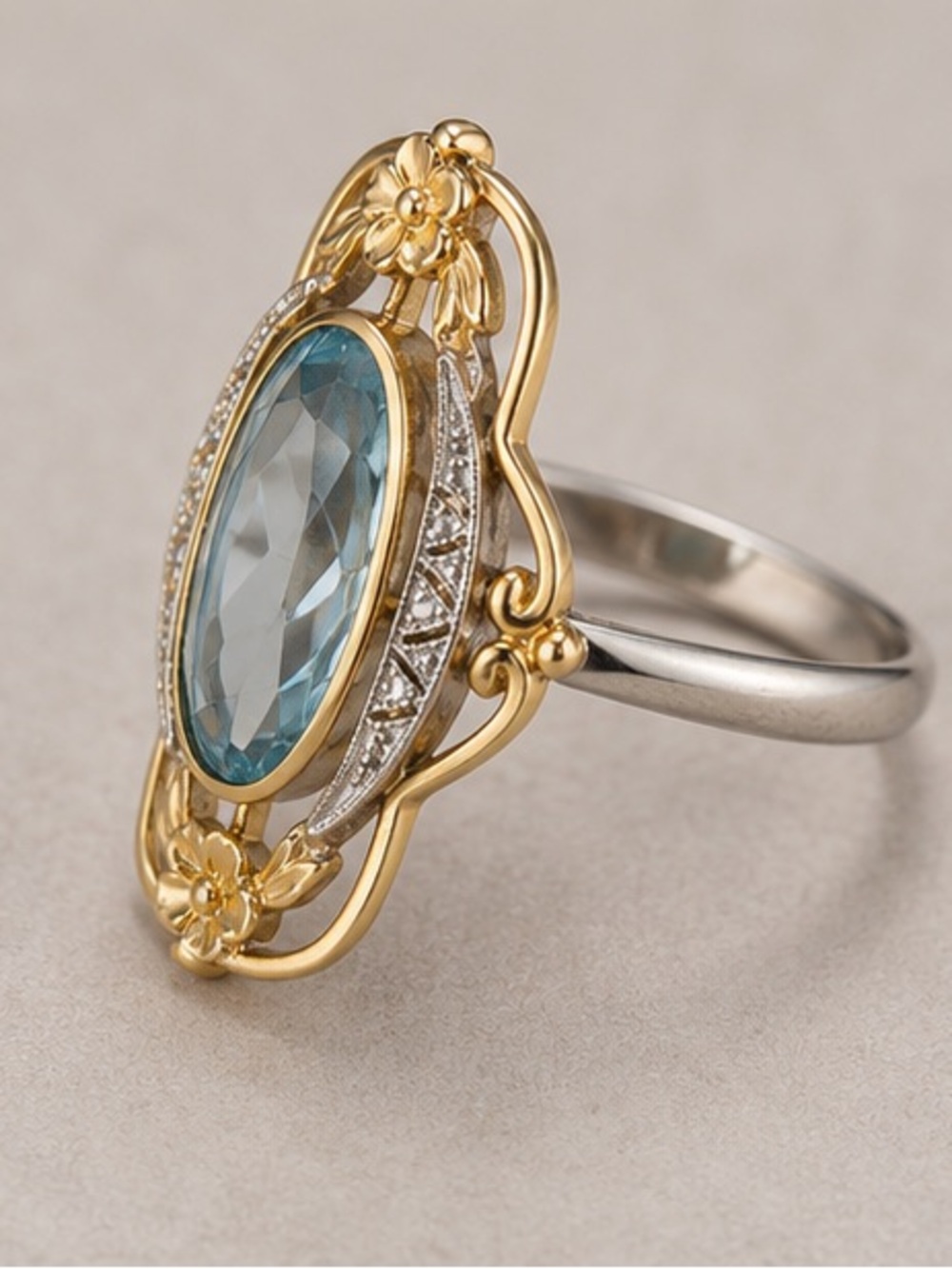 Gold Floral Ring with Faceted Light Blue Oval Gemstone